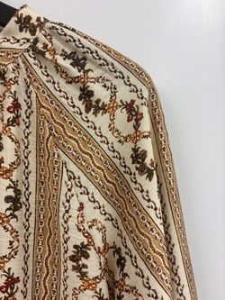 BLUSA ESTAMPADA TONOS TIERRA