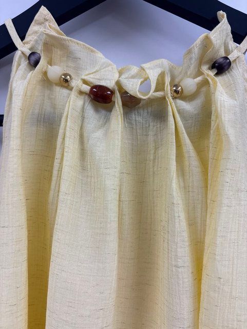 TOP HALTER AMARILLO MANTEQUILLA